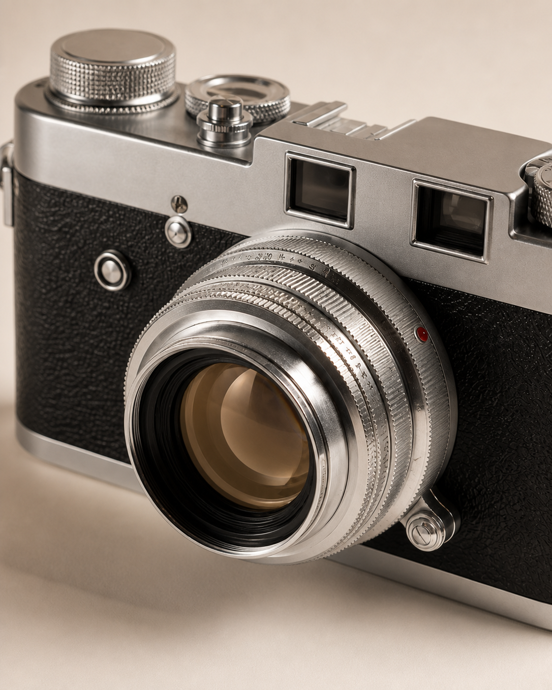 Close front view of the Leica M2 showing its lens barrel, focusing rings and rangefinder windows
