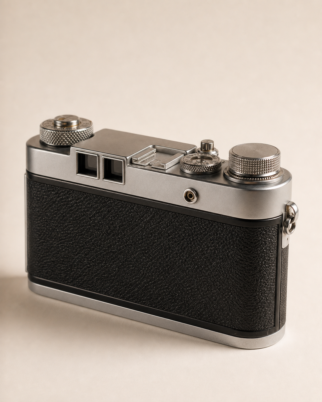 Rear three-quarter view of the Leica M2 showing the back covering, viewfinder windows and top controls